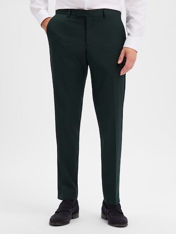 Finshley & Harding Regular Trousers with creases 'Mitch' in Green: front