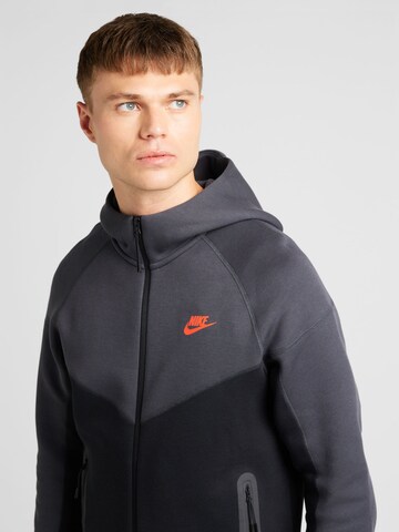 Nike Sportswear Jopa na zadrgo 'TCH FLC' | črna barva