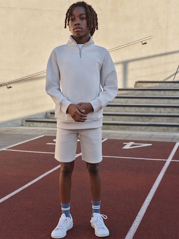 Next Set in Grey: front