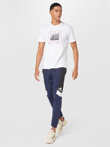 ADIDAS SPORTSWEAR Tapered Workout Pants 'Essentials Colorblock' in Blue