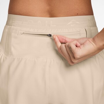 NIKE Regular Athletic Pants 'Trail DF' in Beige