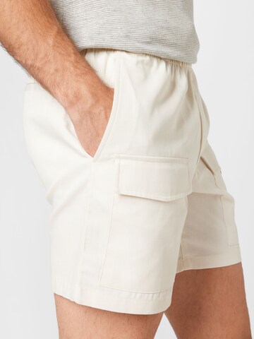 BURTON MENSWEAR LONDON Regular Shorts in Beige