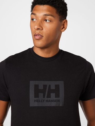 HELLY HANSEN Bluser & t-shirts i sort