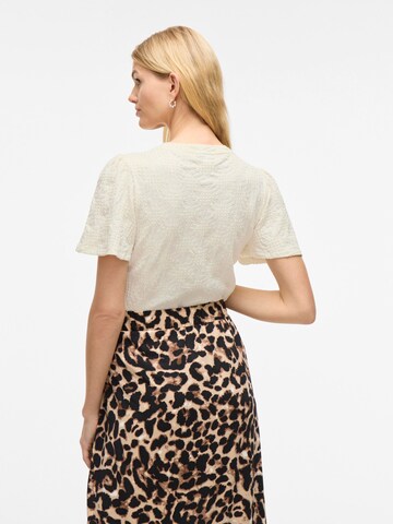 Maglietta di VILA in beige