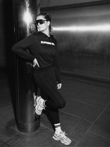 Veste de survêtement 'HELEN' SUPERREBEL® GEAR en noir