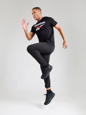Reebok Štandardný strih Športové nohavice 'DESMOND' - Čierna