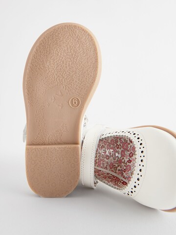 Next - Bailarina en blanco
