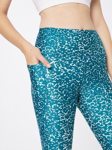 Skinny Pantaloni sportivi di UNDER ARMOUR in verde