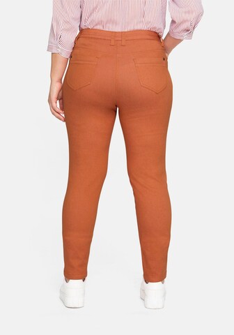 SHEEGO Slimfit Hose in Orange