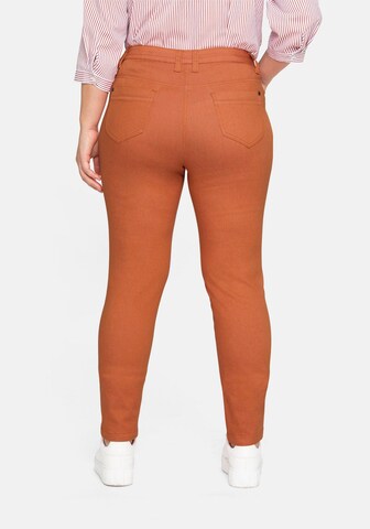 SHEEGO Slim fit Pants in Orange