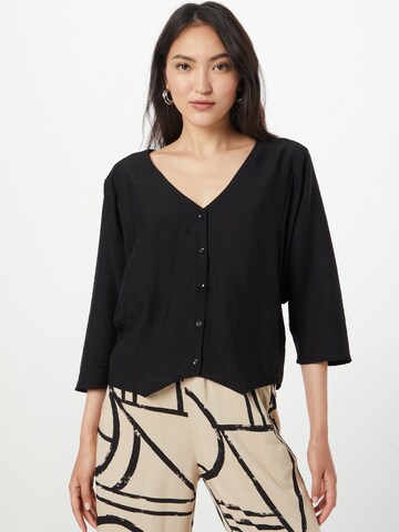 COMMA - Blusa en negro: frente