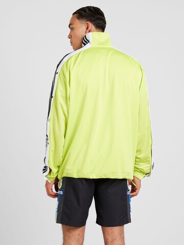 ADIDAS ORIGINALS Φθινοπωρινό και ανοιξιάτικο μπουφάν 'Megabreak' σε κίτρινο
