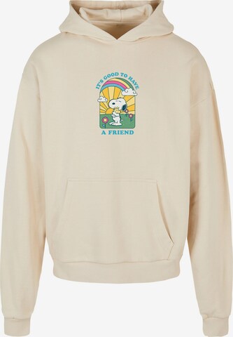 Merchcode Sweatshirt 'Peanuts - It's good to have a friend' in Beige: voorkant