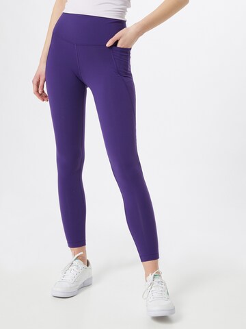 Reebok Skinny Workout Pants in Purple: front