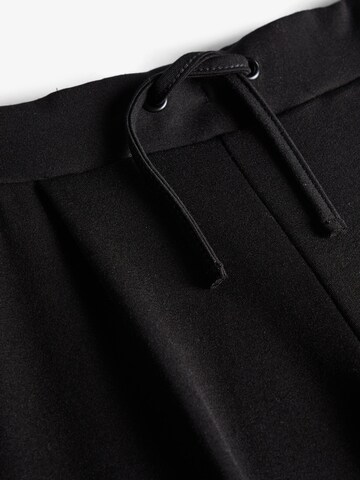 Loosefit Pantaloni 'Idana' di NAME IT in nero