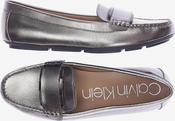 Calvin Klein Flats & Loafers in 39 in Silver: front