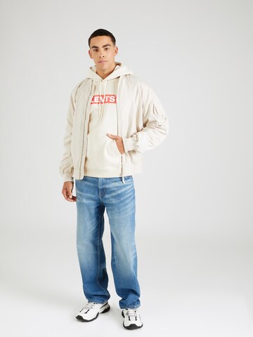 LEVI'S ®Regular Fit Sweater majica 'Relaxed Graphic Hoodie' - bež boja