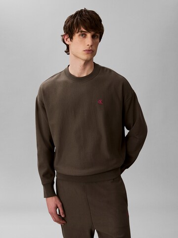 Calvin Klein Jeans Sweatshirt in Brown: front