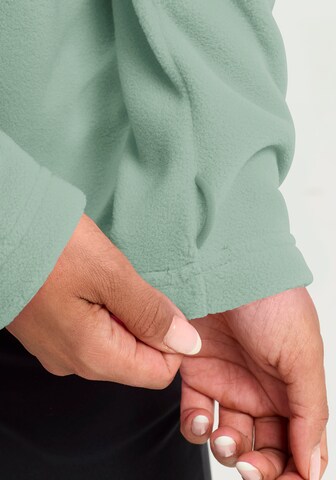 JACK WOLFSKIN Athletic Fleece Jacket in Green