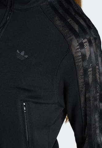 ADIDAS ORIGINALS Between-season jacket 'Firebird' in Black