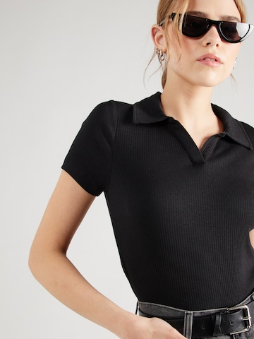 Noisy may Poloshirt 'PASA' in Schwarz