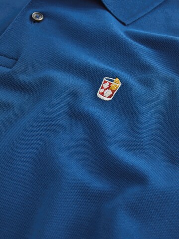 Tricou de la Next pe albastru