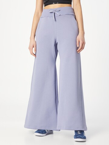 ADIDAS SPORTSWEAR - Pierna ancha Pantalón deportivo 'Lounge Fleece Wide' en lila: frente