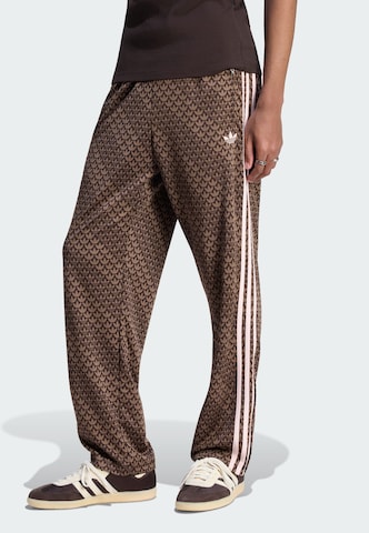 Loosefit Pantaloni 'Firebird' di ADIDAS ORIGINALS in marrone