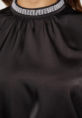 Camicia da donna di faina in nero