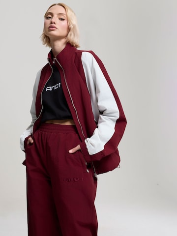 AND1 Zúžený strih Nohavice - Červená