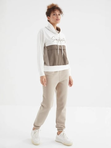 Regular Pantalon de sport Tommy Life en mélange de couleurs