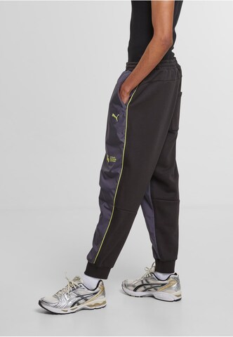 Tapered Pantaloni di PUMA in grigio