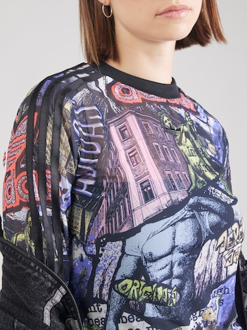 ADIDAS ORIGINALS - Camiseta 'Adidas x Jeremy Scott' en Mezcla de colores