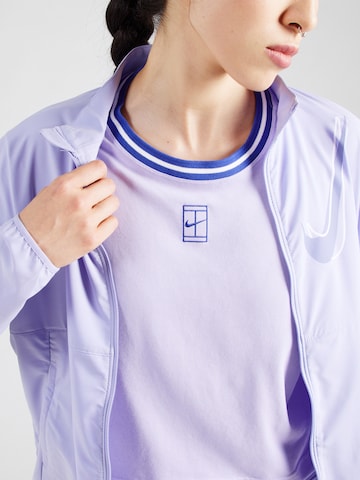 NIKE - Camiseta funcional 'HERTAGE' en lila