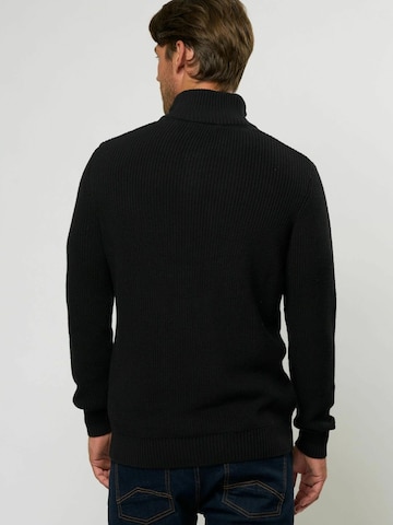 U.S. POLO ASSN. Neulepaita 'Rafael' värissä musta