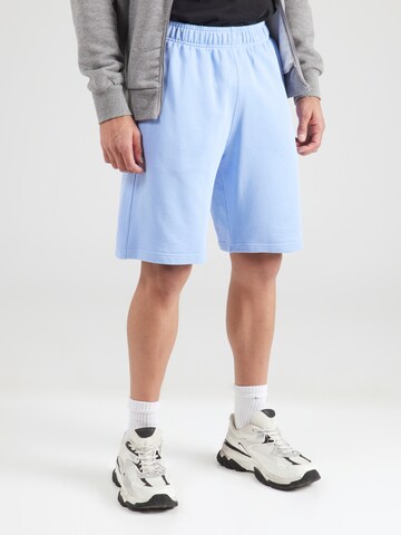 Champion Authentic Athletic Apparel Loose fit Trousers in Blue: front