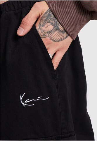 Karl Kani Loose fit Trousers in Black