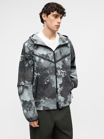 Nike Sportswear Prehodna jakna | črna barva