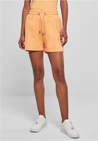 Regular Pantalon Karl Kani en orange : devant