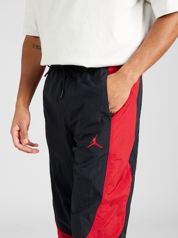 Tapered Pantaloni 'JAM WARM UP' di Jordan in nero