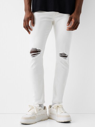 Bershka Skinny Jeans in White: front