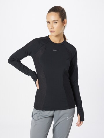 T-shirt fonctionnel NIKE en noir : devant