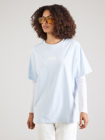 Nike Sportswear T-shirt 'SWOOSH' i blå