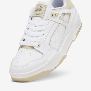 Baskets basses 'Slipstream' PUMA en blanc