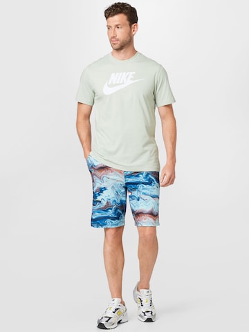 Coupe regular T-Shirt 'Icon Futura' Nike Sportswear en vert