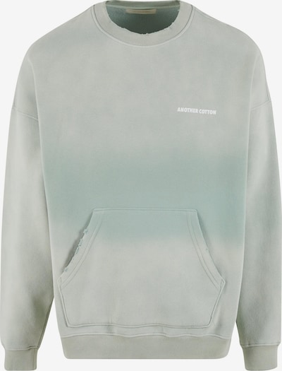 Megztinis be užsegimo 'Matcha' iš Another Cotton Lab, spalva – mėtų spalva / balta, Prekių apžvalga
