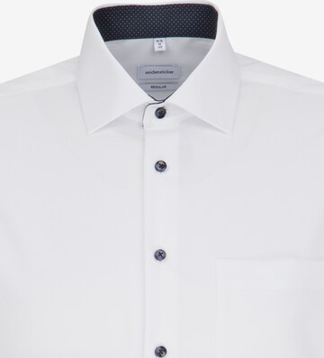 Coupe regular Chemise business ' Regular ' SEIDENSTICKER en blanc