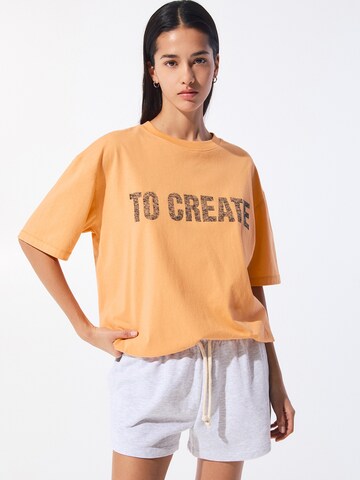 Pull&Bear T-shirt i orange: framsida