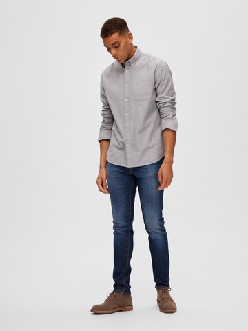 Coupe slim Jean 'Leon' SELECTED HOMME en bleu