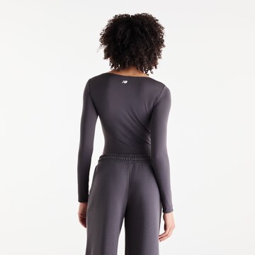 new balance Sportbody 'Trackside Long Sleeve Bodysuit' in Zwart